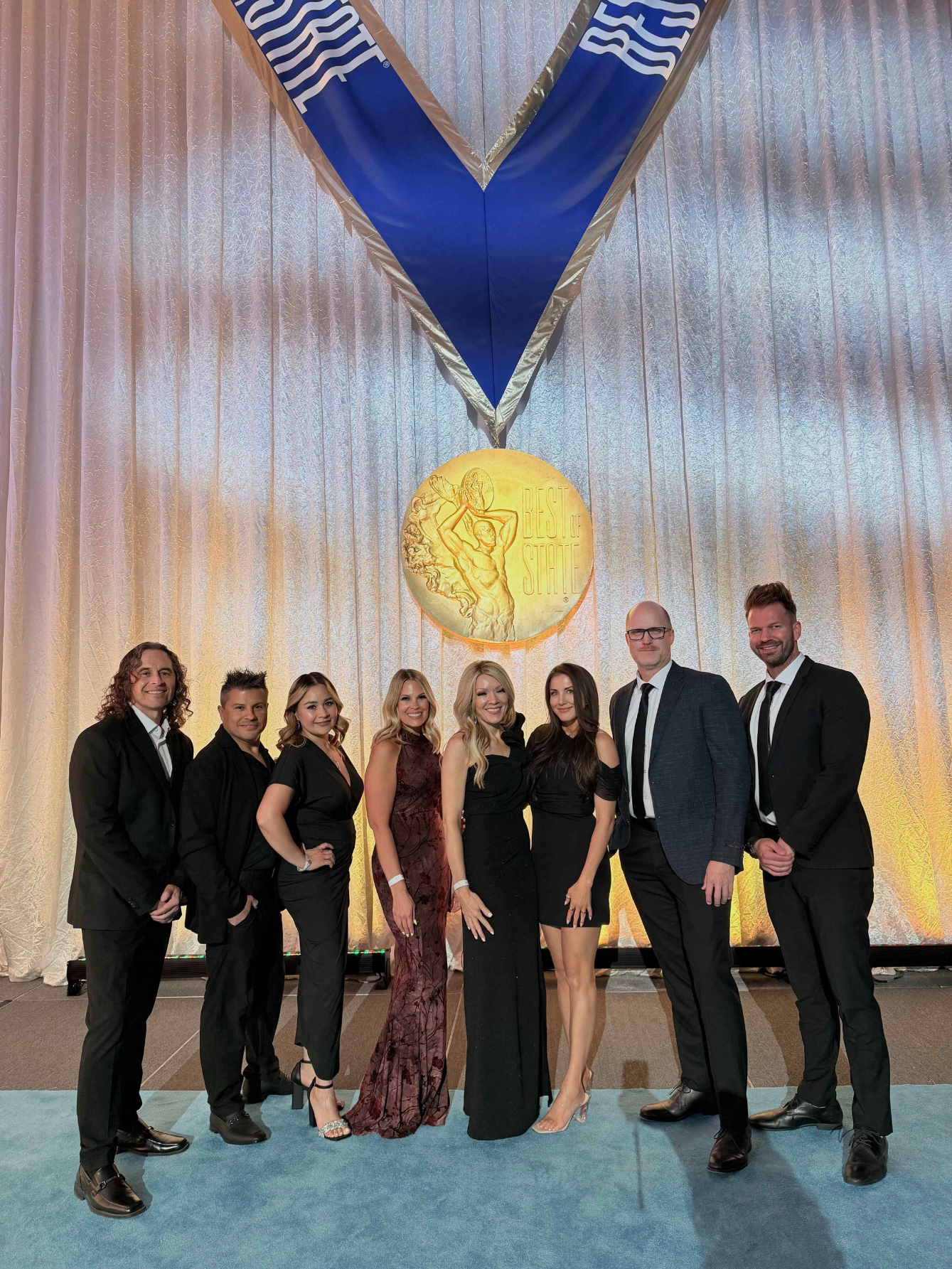 Members of the Xyngular team celebrating after receiving the 2026 Best of State award for excellence in health and nutrition products.
